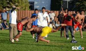 Kabaddi Pro Players playing kabaddi game with each other