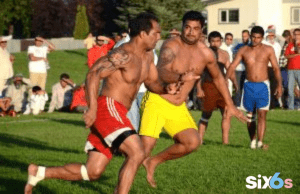 Kabaddi Pro Players playing kabaddi game with each other