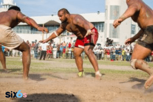 Kabaddi Pro Players playing kabaddi game with each other