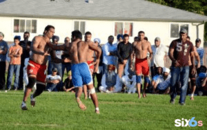 players playing kabaddi game with each other