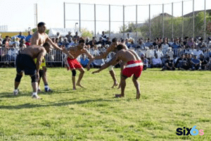 Kabaddi Pro Players playing kabaddi game with each other