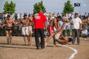 players playing kabaddi game with each other